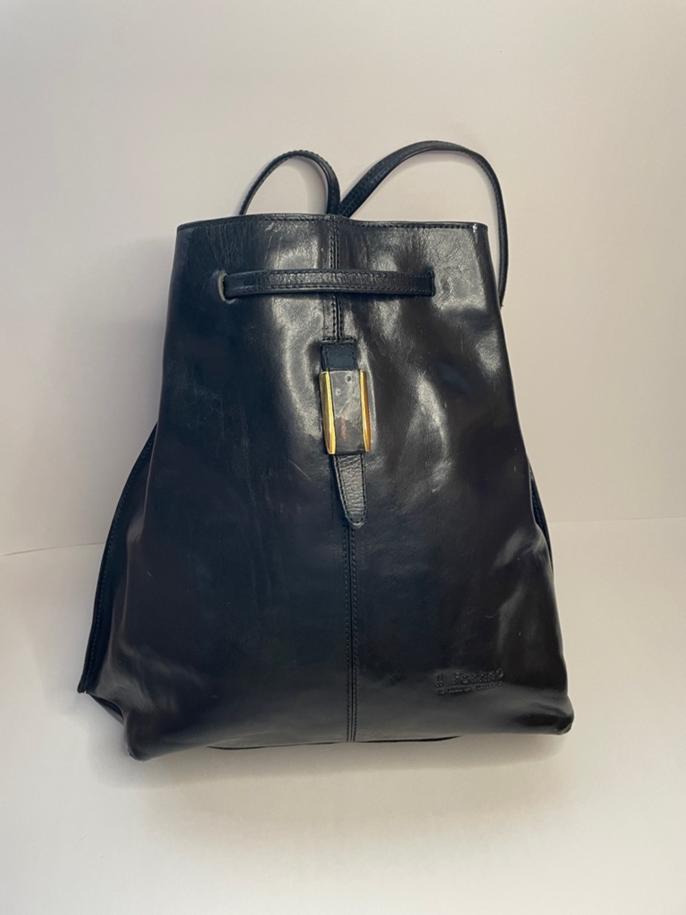 Vintage Black Leather Italian II FORTINO Backpack with Gold Accent.
